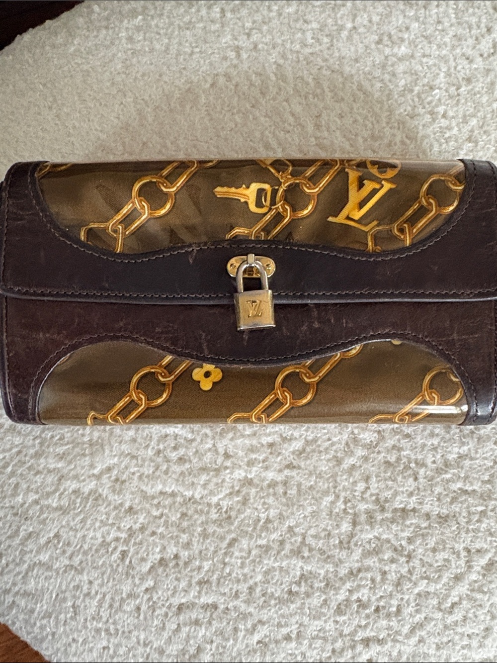 Louis Vuitton Monogram Charms Porte-Monnaie Wallet in brown (7.5 x 4in.)